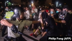 Столкновения полиции с демонстрантами в Гонконге