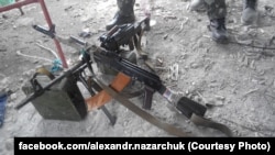 Трофейное оружие и боеприпасы, захваченные военными на шахте "Бутовка" у сепаратистов