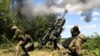UKRAINE – Ukrainian service members fire a shell from a M777 Howitzer near a frontline, as Russia's attack on Ukraine continues, in Donetsk Region, June 6, 2022