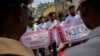 Students protest against the Citizenship Amendment Act in Guwahati, India, on March 12. The new rules implemented by New Delhi on March 11 exclude Muslims, who are the majority in all three countries. 