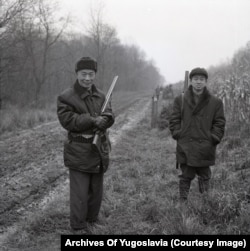 An unnamed North Korean ambassador to Yugoslavia (left) poses with a hunting companion in Karadjordjevo.