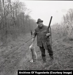 Fadil Hodza, who headed the government of Kosovo, an autonomous province of Yugoslavia, shows off a freshly shot hare in Karadjordjevo.