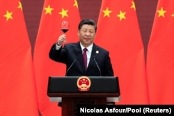Chinese President Xi Jinping raises a toast after a speech at the welcome banquet for leaders attending the Belt and Road Forum in Beijing in April 2019.