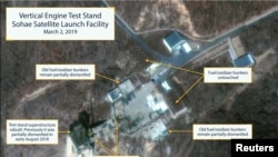 The Sohae Satellite Launching Station features what researchers of Beyond Parallel, a CSIS project, describe as the vertical engine stand partially rebuilt with two construction cranes, several vehicles and supplies laying on the ground in a commercial satellite image.