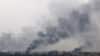 지난 11일 우크라이나 도네츠크 지역의 차시브 야르 마을 부근이 러시아군의 폭격 직후 화재로 연기가 피어오르고 있다.