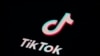 FILE - The icon for the video-sharing app TikTok appears on a smartphone in Marple Township, Pennsylvania, Feb. 28, 2023. U.S. President Joe Biden's 2024 presidential campaign is using TikTok.
