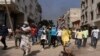 FILE - Demonstrators protest President Macky Sall's decision to postpone the Feb. 25 presidential election, in Dakar, Senegal, Feb. 9, 2024.