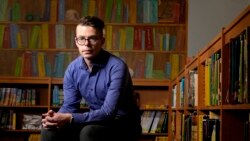 Tom Bober, librarian and President of the Missouri Association of School Librarians, poses for a photo Wednesday, March 20, 2024, in Clayton, Mo. (AP Photo/Jeff Roberson)