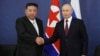 FILE - Russian President Vladimir Putin, right, and North Korean leader Kim Jong Un shake hands during their meeting in Tsiolkovsky, Russia, on Sept. 13, 2023.