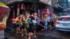 Locals celebrate the Sonkran water festival in Bangkok, Thailand, April 13, 2024.