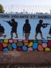 FILE - A mural is seen, March 1, 2023, in Ouagadougou, Burkina Faso.