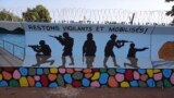 FILE - A mural is seen, March 1, 2023, in Ouagadougou, Burkina Faso.