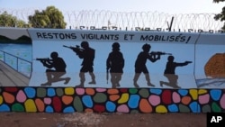 FILE - A mural is seen, March 1, 2023, in Ouagadougou, Burkina Faso.