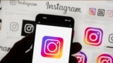 FILE - The Instagram logo is seen on a cellphone in Boston, Oct. 14, 2022.
