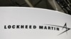 FILE - The Lockheed Martin logo is seen during the annual International Astronautical Congress at the Walter E. Washington Convention Center in Washington, Oct. 22, 2019. 