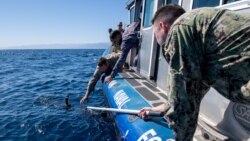 FILE - Sailors from Jordan and other nations retrieve an unmanned undersea drone during a military exercise in the Gulf of Aqaba, Jordan, on February 8, 2022 (U.S. Naval Forces Central Command/2nd Class Dawson Roth/Handout via REUTERS)