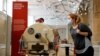 FILE - A staff member poses next to an iron lung in the Science Museum during a Guest Preview Day ahead of the official opening in London, Aug. 17, 2020. Paul Alexander of Dallas, Texas, a polio survivor knows as the "man in the iron lung" died aged 78 on March 12, 2024.