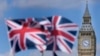 资料照：英国议会大厦与英国国旗