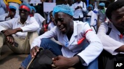 Doctors and other medical staff take part in a protest in downtown Nairobi, Kenya.&nbsp;Hundreds of doctors have protested in the streets demanding better pay and working conditions in an ongoing nationwide strike for about a month.