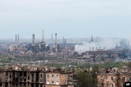 Smoke rises from the Azovstal Iron and Steel Works in Mariupol, May 5, 2022.  