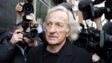 FILE - Journalist, John Pilger, a supporter of Wikileaks founder Julian Assange arrives at the City of Westminster Magistrates Court in London where Julian Assange is in court for his bail hearing, Tuesday, Dec. 14, 2010.