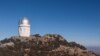 The Nicholas U. Mayall Telescope is located at Kitt Peak National Observatory in Arizona. The telescope currently hosts the Dark Energy Spectroscopic Instrument, the most powerful multi-object survey spectrograph in the world. (NOIRLab)
