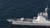 资料照片：2023年3月17日的这张照片中，一艘中国军舰参加了伊朗、俄罗斯和中国在伊朗阿曼湾举行的联合海军军事演习。（路透社照片）