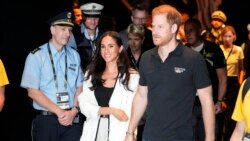 FILE—Britain's Prince Harry, right, and Meghan, Duchess of Sussex, arrive to a wheelchair basketball match at the Invictus Games in Duesseldorf, Germany, September 13, 2023.