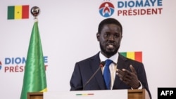 Senegalese opposition presidential candidate Bassirou Diomaye Faye addresses his first press conference after being declared winner of Senegal's presidential election, in Dakar, on March 25, 2024.