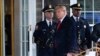 Former President Donald Trump arrives for the wake of New York City police officer Jonathan Diller, March 28, 2024, in Massapequa Park, N.Y. Diller was shot and killed Monday during a traffic stop, the city's mayor said.