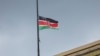 A Kenyan national flag flies at half mast in Nairobi on April 19, 2024, in honor of its defense chief General Francis Omondi Ogolla and nine other senior military officers who were killed in a helicopter crash.