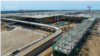 Rampa de acceso a Ciudad Aeropuerto Jorge Chávez. El proyecto actual comprende el nuevo terminal de pasajeros, las zonas de acceso y la gestión del anterior aeropuerto.