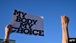 Pro-abortion rights demonstrators rally in Scottsdale, Arizona, after the state&#39;s top court ruled a 160-year-old near total ban on abortion is enforceable.