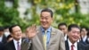 FILE - Thailand Prime Minister Srettha Thavisin waves to reporters as he walks with fellow cabinet members to the first official cabinet meeting at Government House in Bangkok on September 6, 2023.