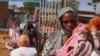 FILE - A Doctors Without Borders handout photo from January 2024 shows a woman and baby at the Zamzam displacement camp, close to El Fasher in North Darfur, Sudan. Fighting between RSF and the Sudanese Armed Forces appears ready to engulf the area. 