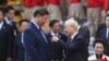 2023年12月12日，中国国家主席习近平和越共总书记阮富仲在河内总统府出席欢迎仪式。（美联社照片）