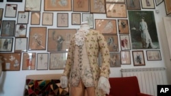 The Amadeus dress by Milos Forman is displayed at the Tirelli Atelier in Rome, Tuesday, March 5, 2024. (AP Photo/Gregorio Borgia) 