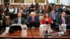 FILE - Former President Donald Trump sits in the courtroom with his legal team before the continuation of his civil business fraud trial at New York State Supreme Court, Oct. 3, 2023, in New York. Trump's bid to postpone the trial was rejected Oct. 6.