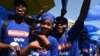 Supporters of the South African opposition party Democratic Alliance (DA) react during the DA's manifesto launch at the Union Buildings in Pretoria, on Feb. 17, 2024. 