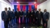 Members of Haiti's new transitional council pose for a group photo during an installation ceremony in Port-au-Prince, Haiti, April 25, 2024.