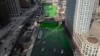 The Chicago River is dyed green ahead of St. Patrick's Day celebrations, March 16, 2024, in Chicago. 