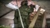 11일 러시아 국가반테러위원회(NAC)가 공개한 사진. 러시아 연방보안국(FSB) 특수부대 요원이 러시아 남부 카바르디노발카르공화국 주도 날치크 외곽의 저택에서 작전을 수행중이다.