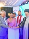 Iranian President Ebrahim Raisi, second right, and Sri Lankan President Ranil Wickremesinghe, in grey suit, inaugurate the Uma Oya project in Uma Oya, some 180 km east of Colombo, Sri Lanka, April 24, 2024. (Sri Lanka President's Office via AP) 