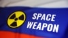 A Russian flag, the nuclear symbol and the words "space weapon" are seen in this illustration photo taken March 13, 2024. Russia's defense minister has denied that Moscow is developing a space-based anti-satellite nuclear weapon.