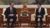 资料照片: 2023年10月17日塞尔维亚共和国总统武契奇在北京会见王沪宁