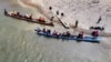 2024年2月24日，穿越巴拿马雨林而后乘船从原住民村落巴霍奇基托(Bajo Chiquito)到达拉哈斯布兰卡斯(Lajas Blancas)移民接收点的移民。船上有不少中国走线移民。船费为每人25美元。