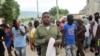 L'ancien policier Jimmy "Barbecue" Cherizier, chef de la coalition "G9", mène une marche contre le Premier ministre haïtien Ariel Henry, à Port-au-Prince, Haïti, le 19 septembre 2023. (REUTERS/Ralph Tedy Erol)