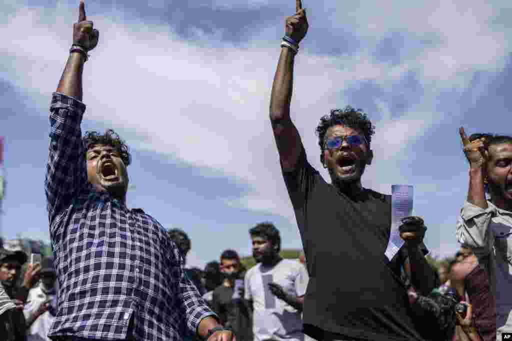 Protesters gather to demand that acting president and Prime Minister Ranil Wickremesinghe resign, in Colombo, Sri Lanka.