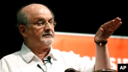 FILE — Author Salman Rushdie talks about the start of his writing career, during the Mississippi Book Festival, in Jackson, Miss., on Aug. 18, 2018. Iran’s Foreign Ministry on Monday denied any Iranian involvement in the recent stabbing of the writer.