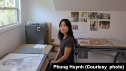 Phung Huynh sits in her studio. (Courtesy photo of Phung Huynh)